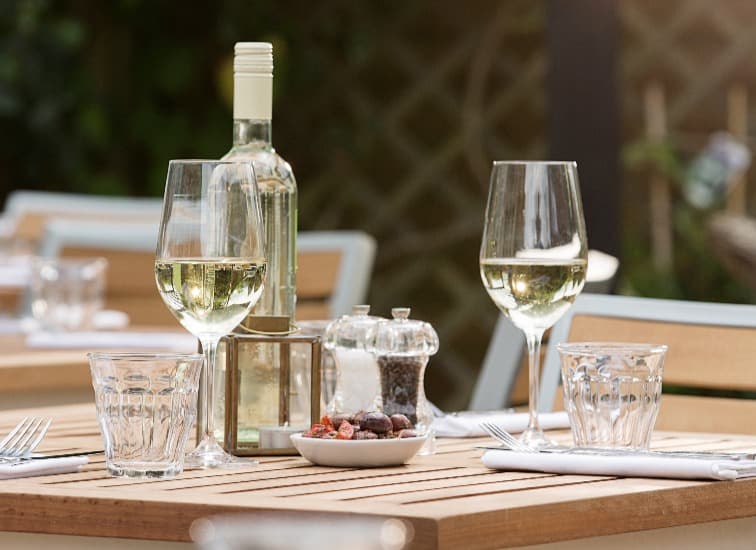 Cover Image for Enjoy a glass of wine, on the house!